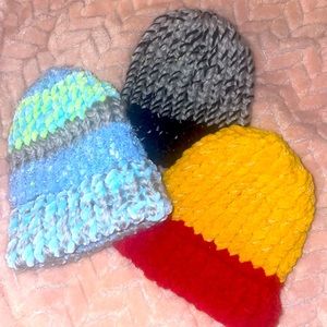 Homemade crochet baby hat set of three, for a baby boy.